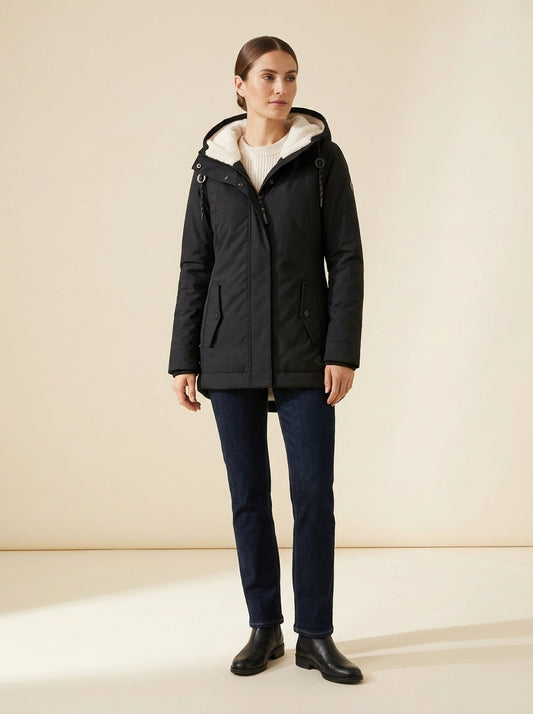 Parka impermeable Seravia negra con capucha de borreguito